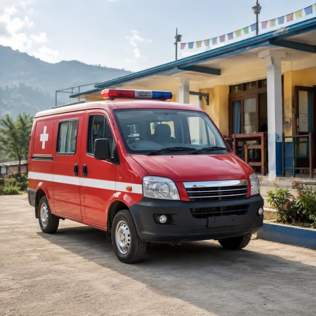 Red ambulance safely parked outside a Nepal health clinic for the bilingual Ambulance and एम्बुलेन्स lesson